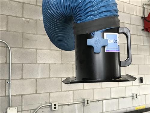 Damper for exhaust arm